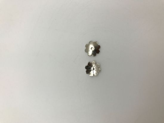 Picture of Nickel Silver Extra-Large Stamped Rosette, 1/2" Diameter, Sold per Pkg of 10