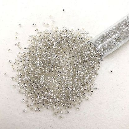 Picture of Size 11 Japanese Seed Beads, Slilver Lined Crystal/Blue Splash Glow in the Dark (#2701S), Approximately 25 Grams