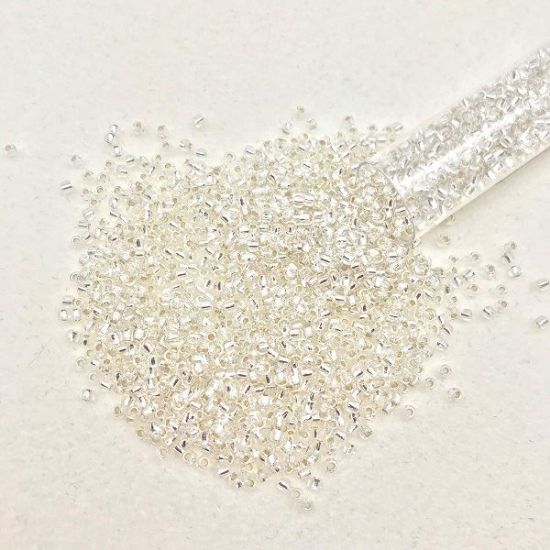 Picture of Size 11 Japanese Seed Beads, Slilver Lined Crystal/Green Splash Glow in the Dark (#2700S), Approximately 25 Grams