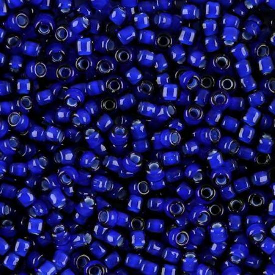 Picture of Cobalt Colorlined White Seed Bead #327A / Size 8<br />Approximately 25 Grams
