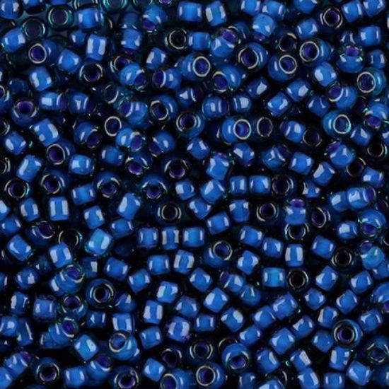 Picture of Teal Colorlined Purple Seed Bead #399L / Size 8<br />Approximately 25 Grams