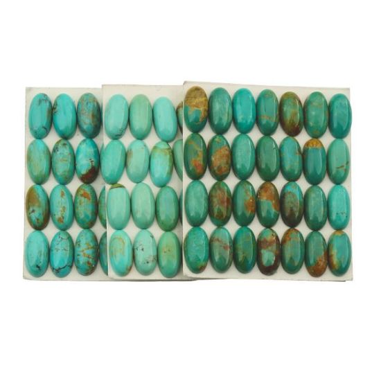 Picture of Turquoise Oval Stabilized Kingman Cabochon 7x14mm